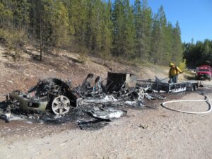 Remains of truck and trailer consumed by fire on North Fork Road, September 6, 2024 - W. K. Walker