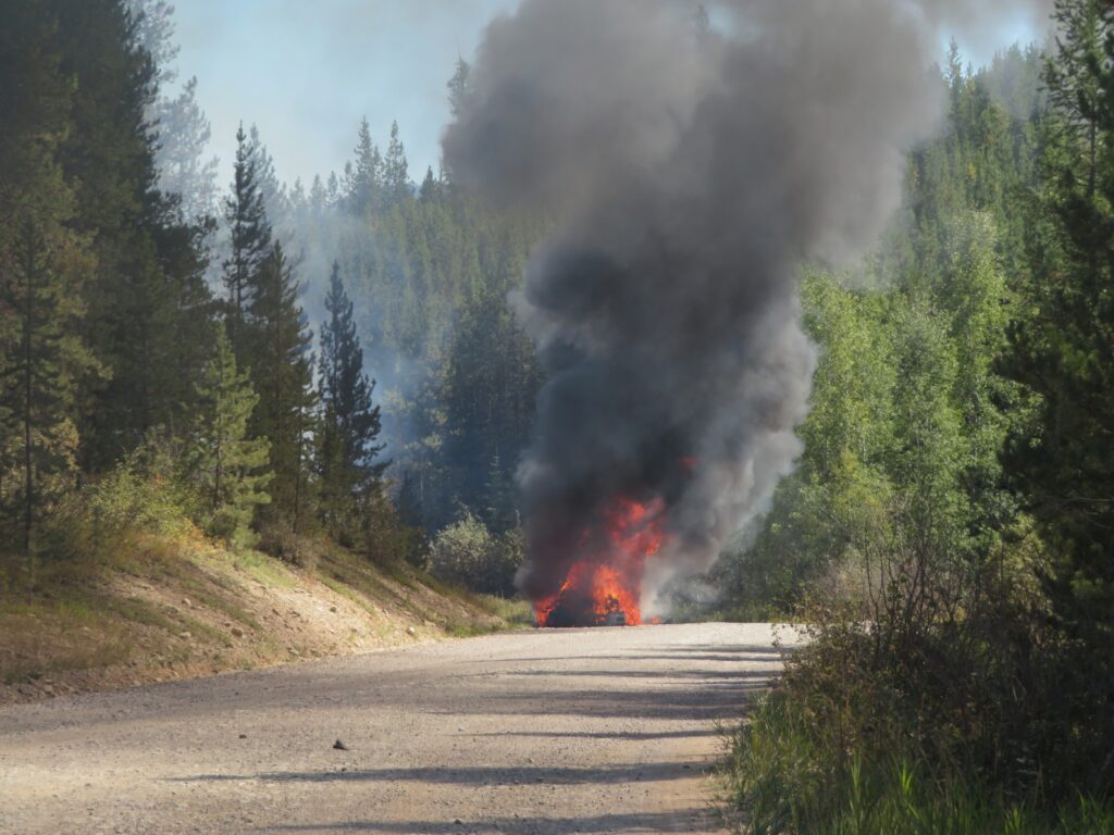 Truck and trailer being consumed by fire on North Fork Road, September 6, 2024 - W. K. Walker