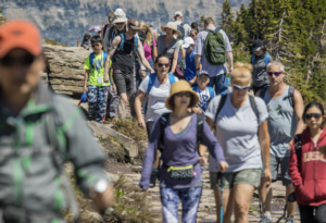 Visitors on trail in Glacier National Park